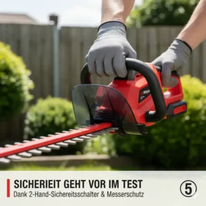 Eine Hand drückt den Sicherheitsschalter einer akku heckenschere, um die Klinge zu aktivieren.